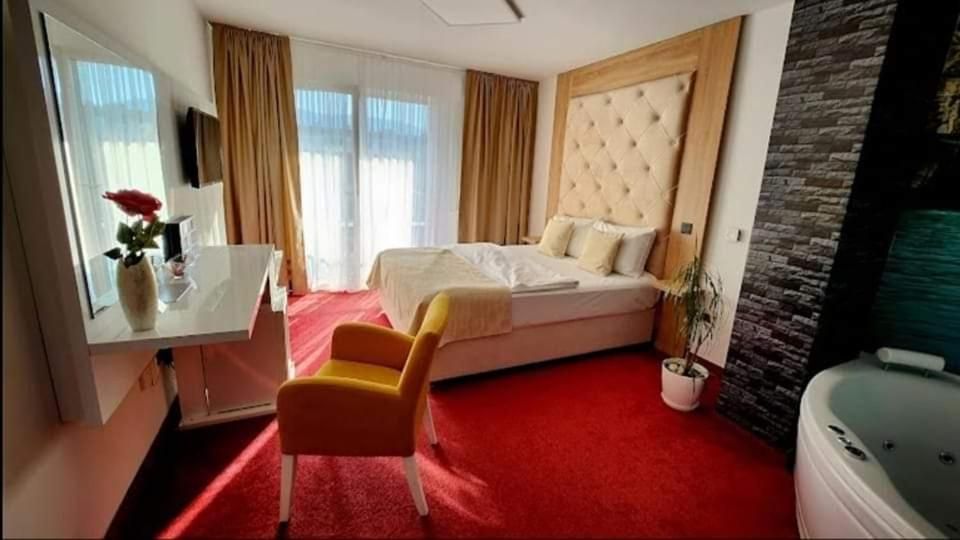 Spavaća soba s francuskim ležajem u apartmanu Bulevar